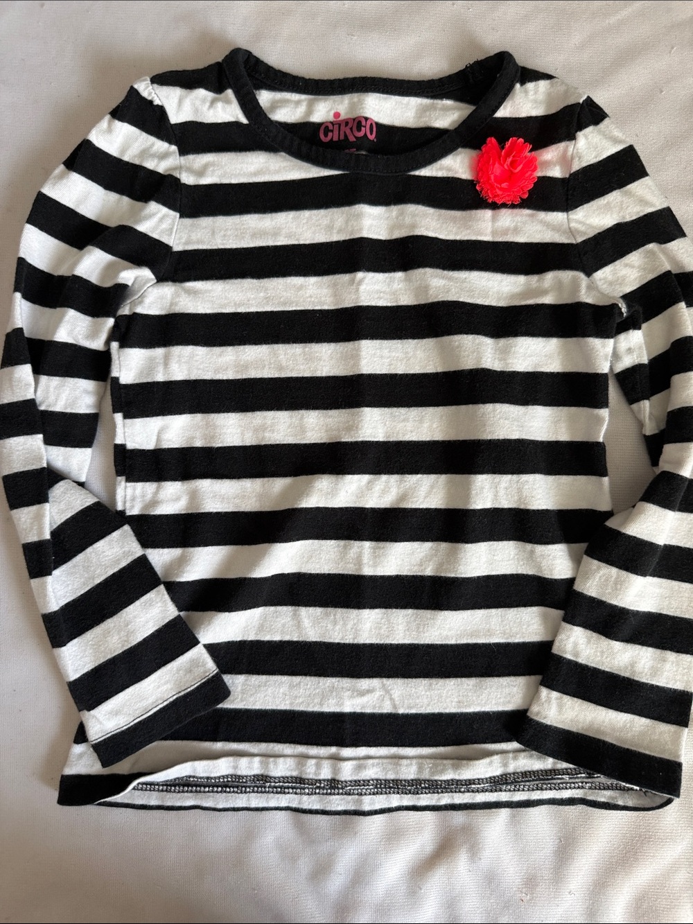 Circo Black & White Striped Long-Sleeve Top with Hot Pink Flower Accent
